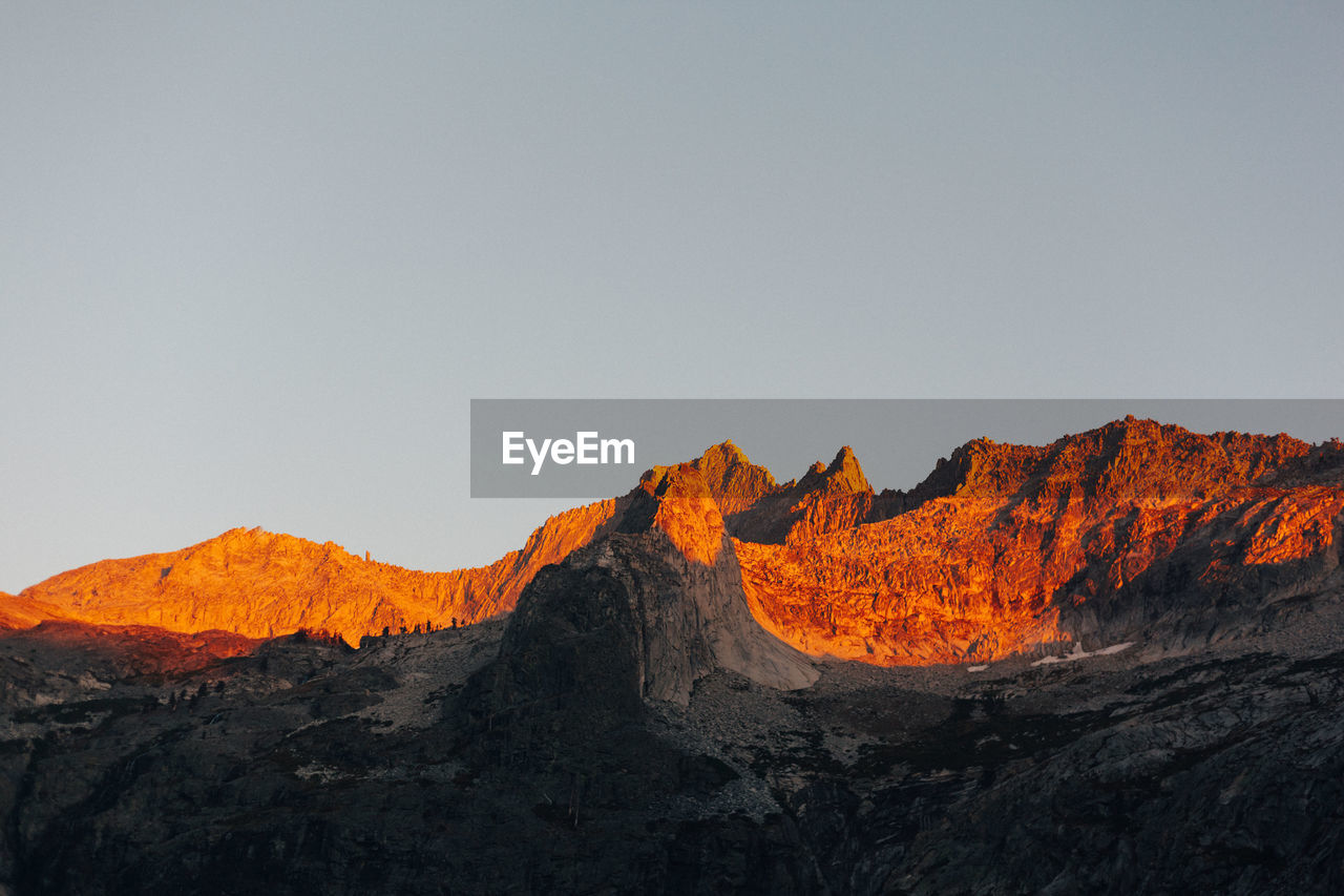 SCENIC VIEW OF MOUNTAIN AGAINST SKY