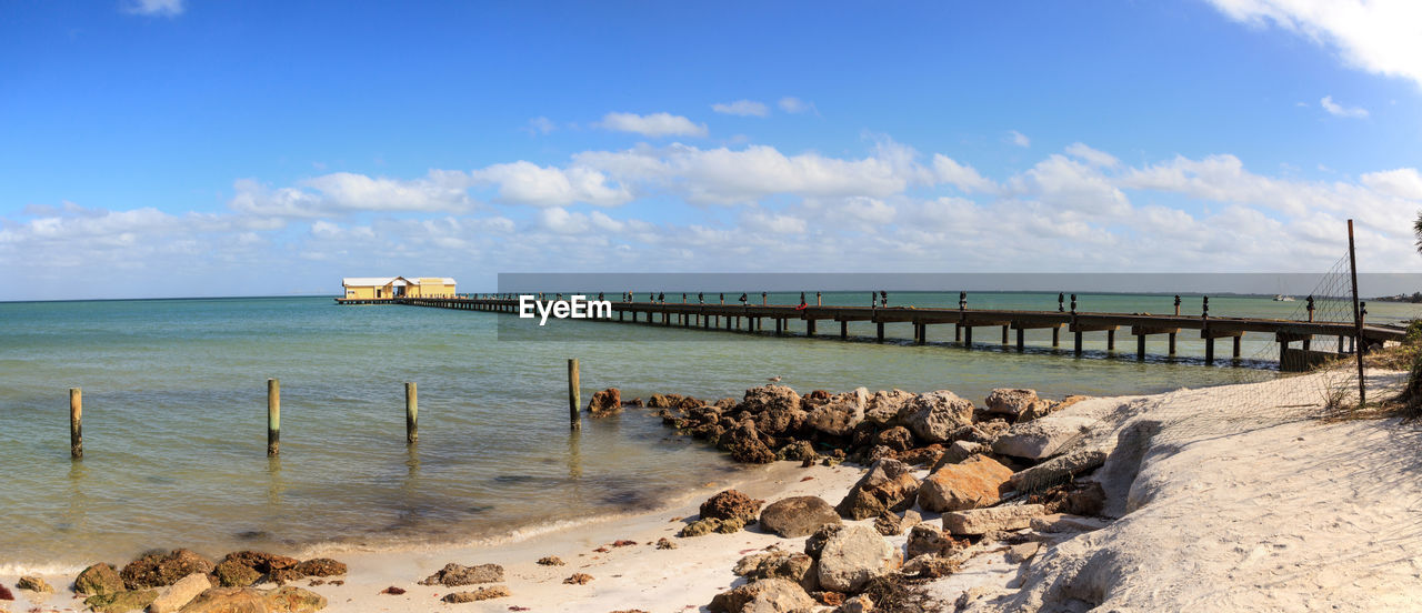 Blue sky over the anna maria island city pier on anna maria island, florida.