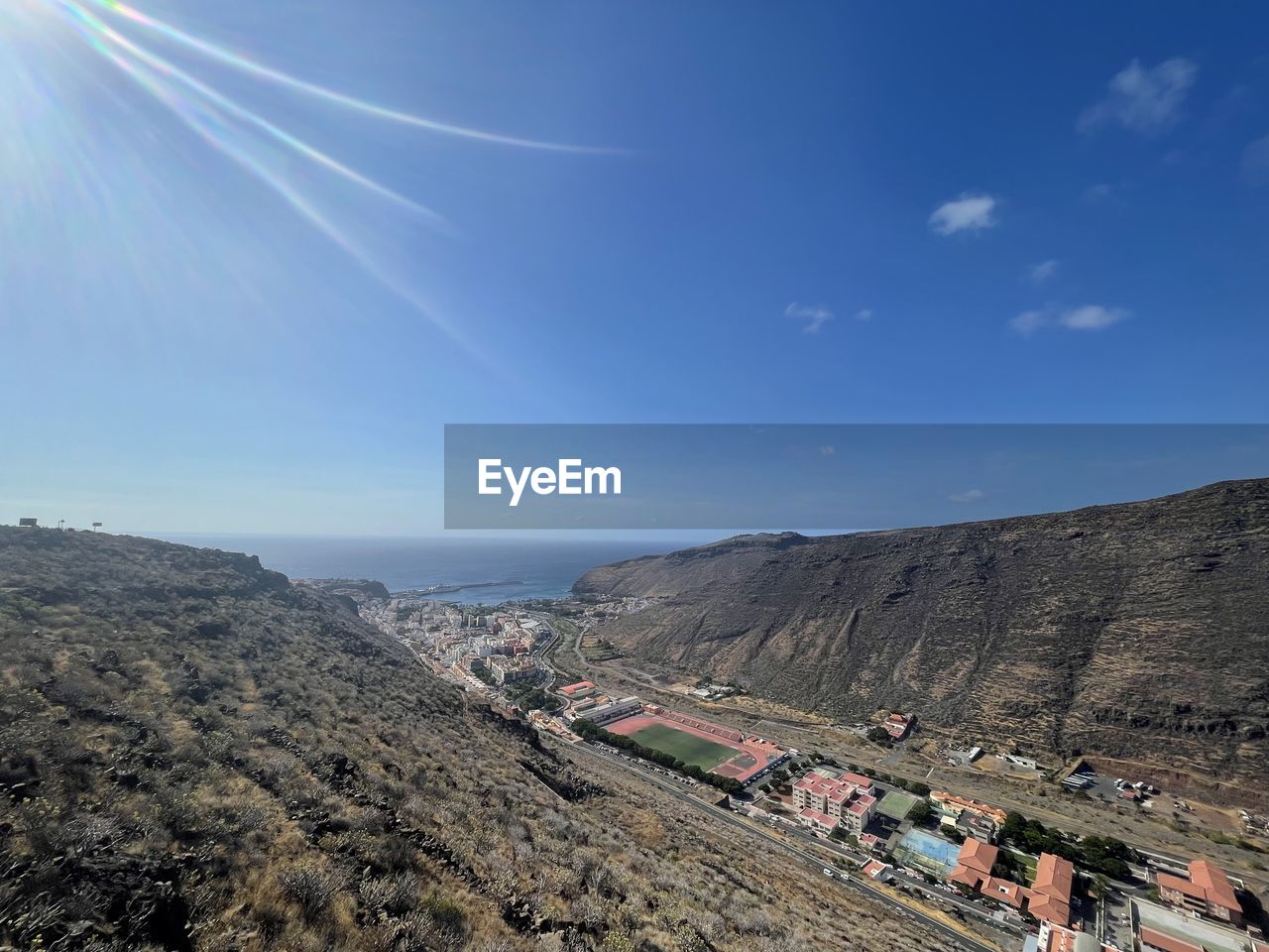 HIGH ANGLE VIEW OF LAND AND MOUNTAIN AGAINST SKY