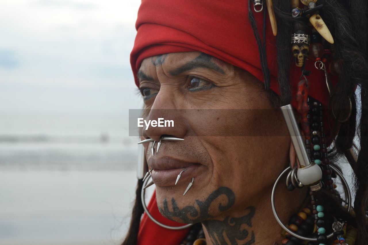 Close-up of man wearing traditional clothing