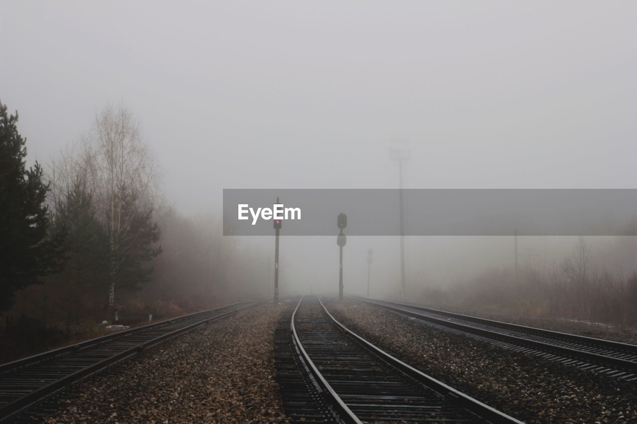 RAILWAY TRACKS IN FOGGY WEATHER