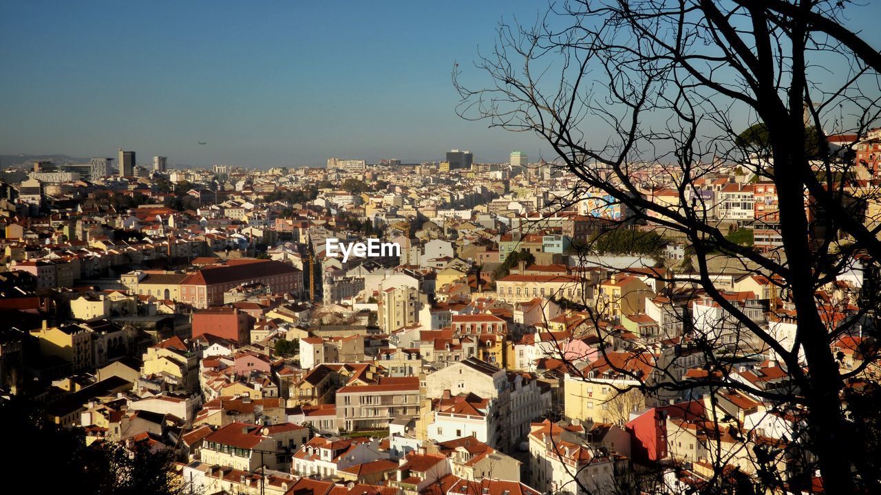 Cityscape against clear sky