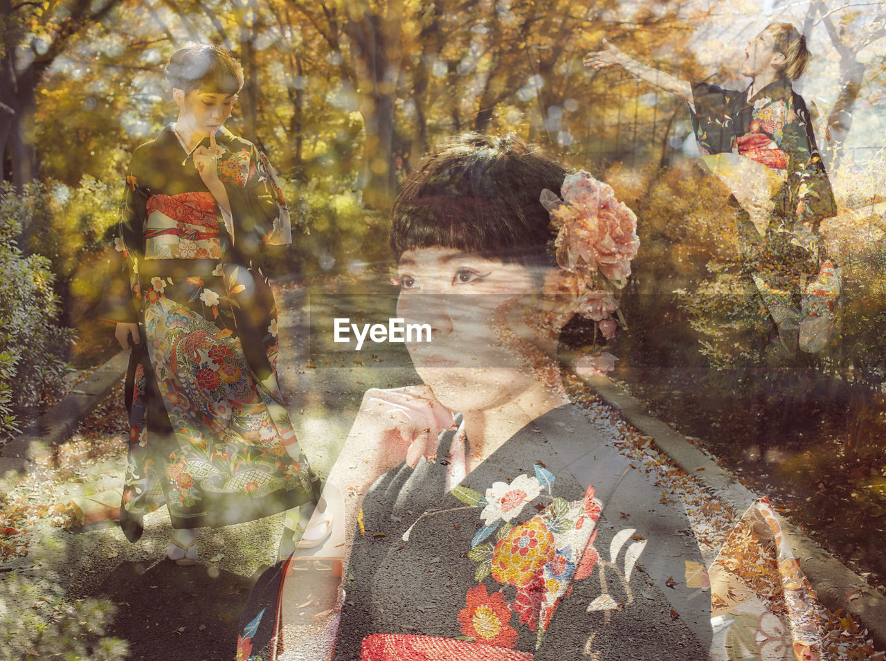 Multiple exposure of woman and autumn trees