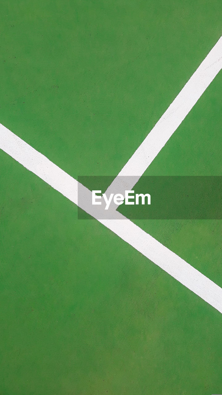 line on tennis court Tennis Court Dividing Line White Color Grass Green Color