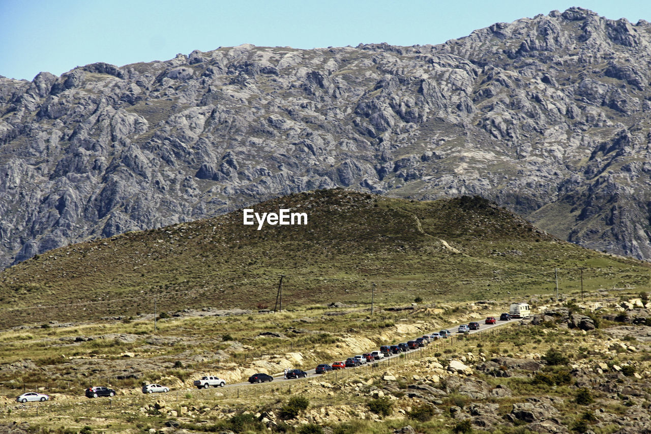 SCENIC VIEW OF MOUNTAIN AGAINST SKY