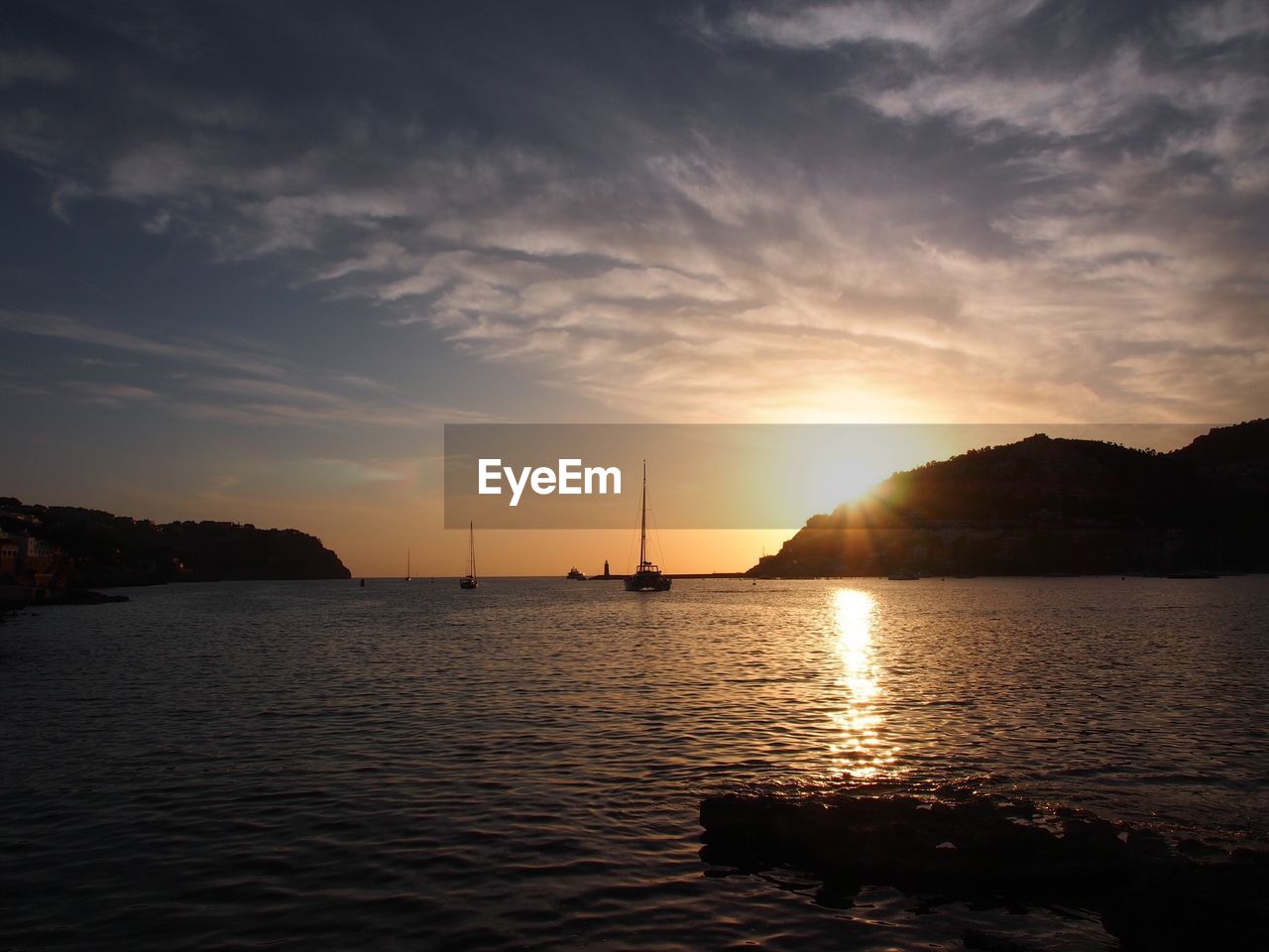 Scenic view of sea against sky during sunset