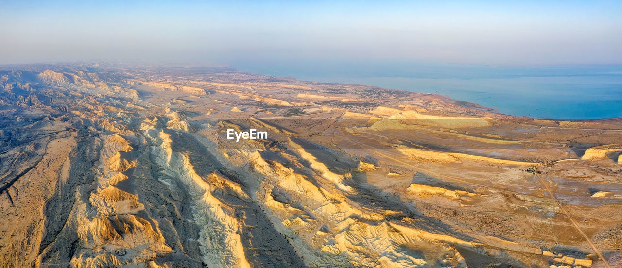 Aerial view of dramatic landscape against sky