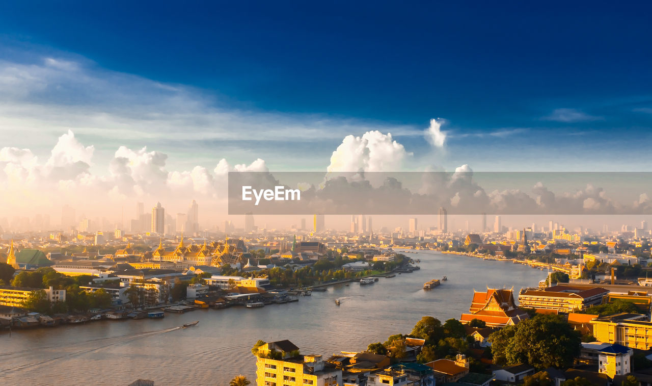 PANORAMIC VIEW OF COMMERCIAL DOCK AGAINST SKY