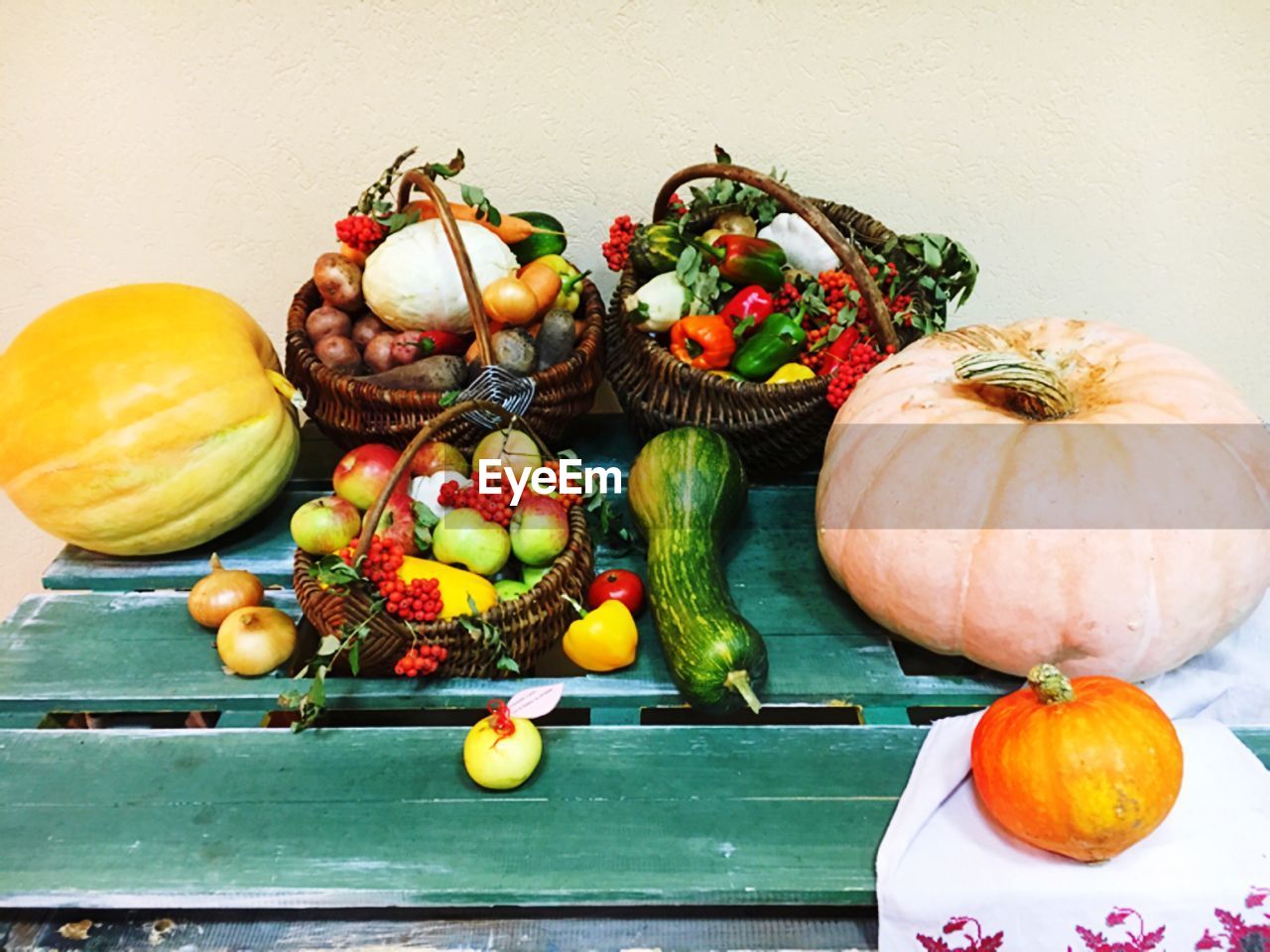 High angle view of fruits and pumpkins on table 