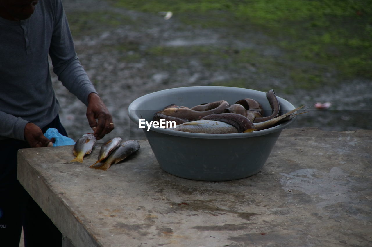 Close-up of person preparing food