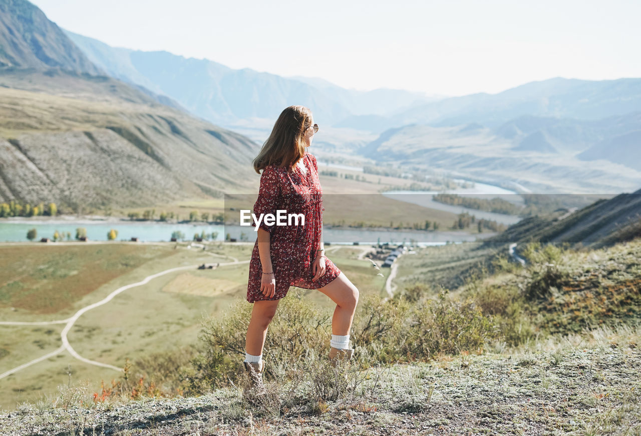 Full length of woman standing on land