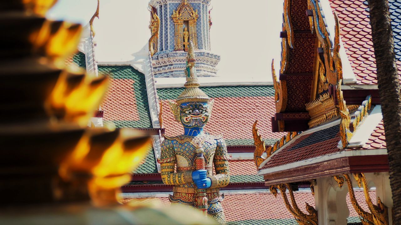 Statue of temple against sky