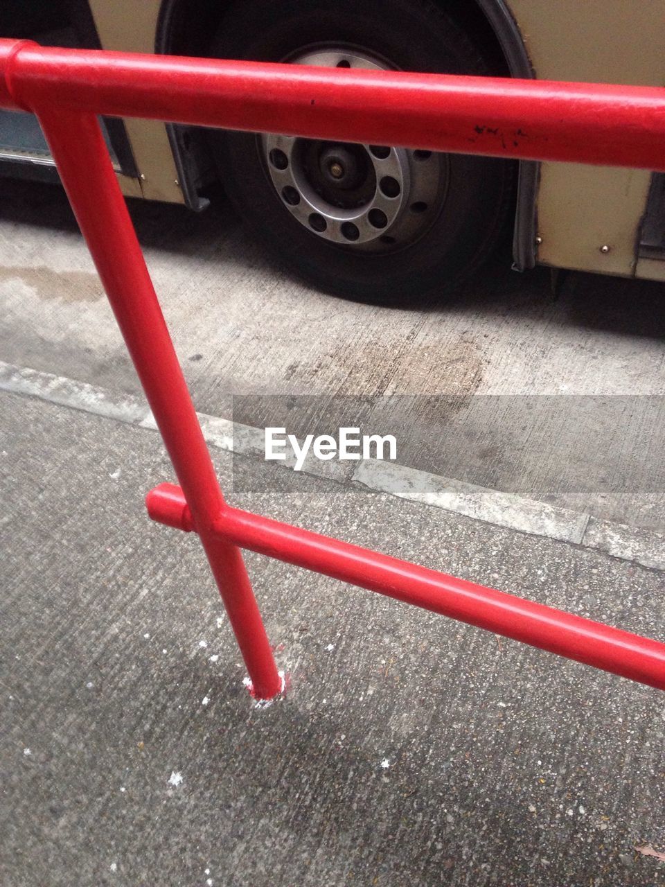 High angle view of railing on bus stop
