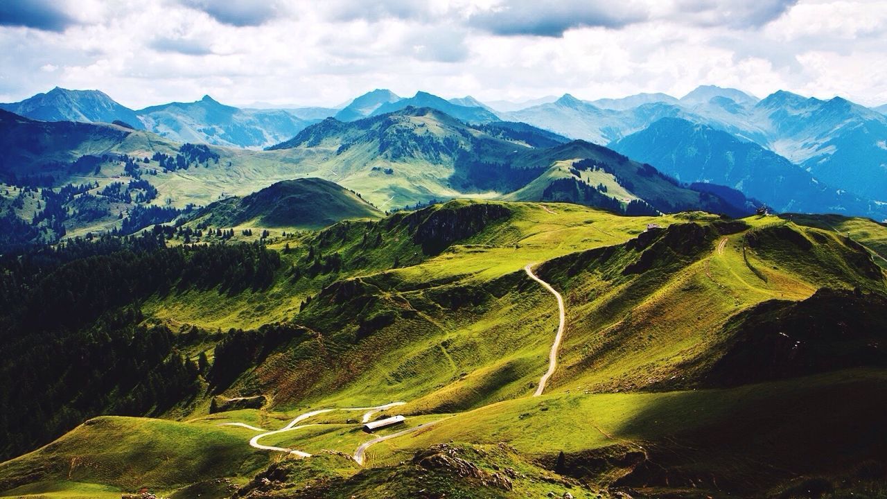 Country road leading towards mountains