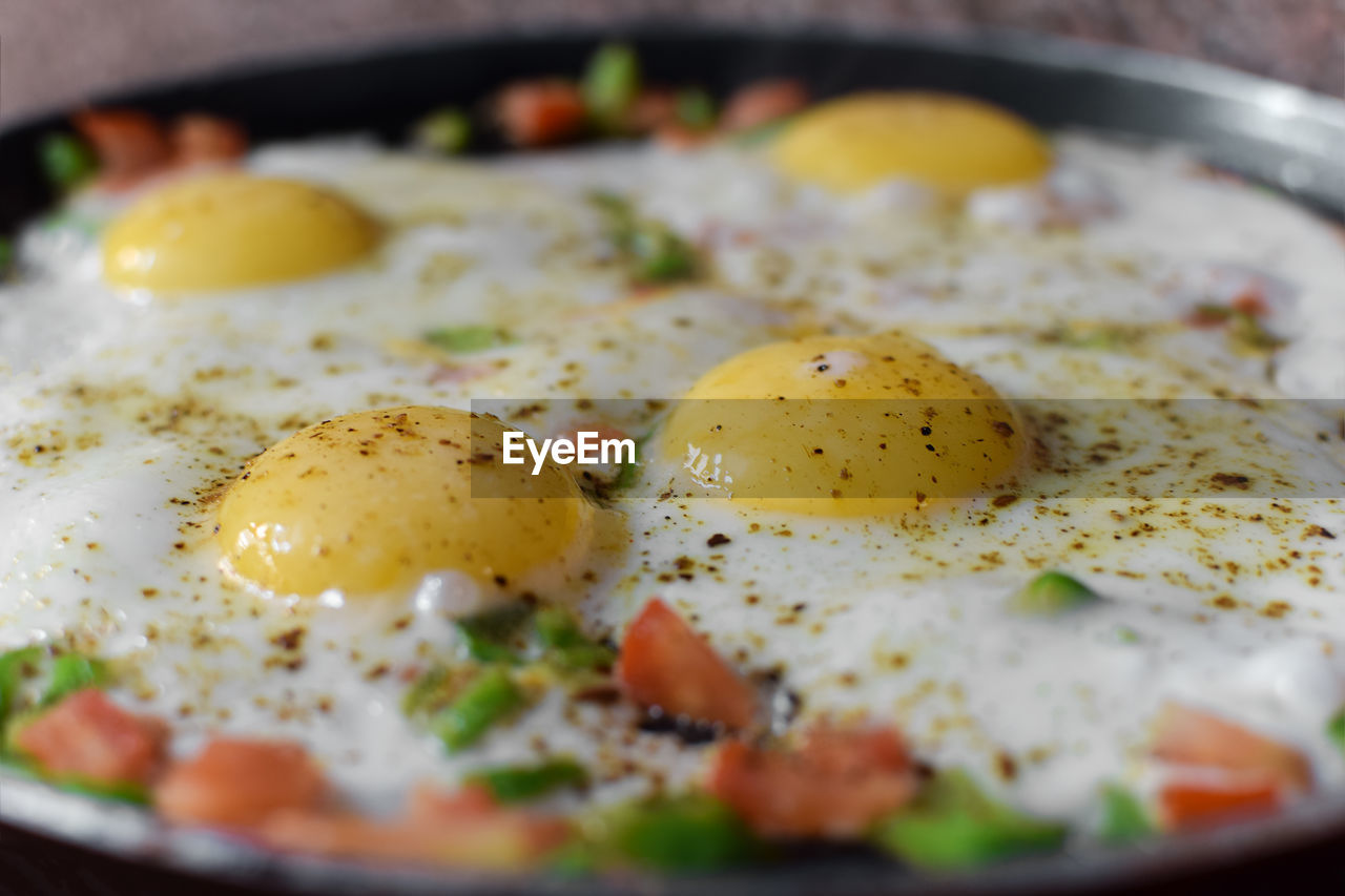 Close-up of fried egg in pan