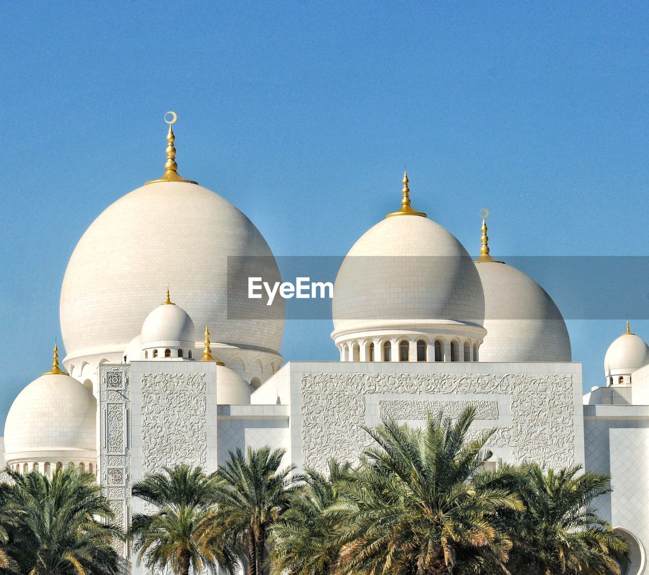 Exterior of mosque  building against clear sky