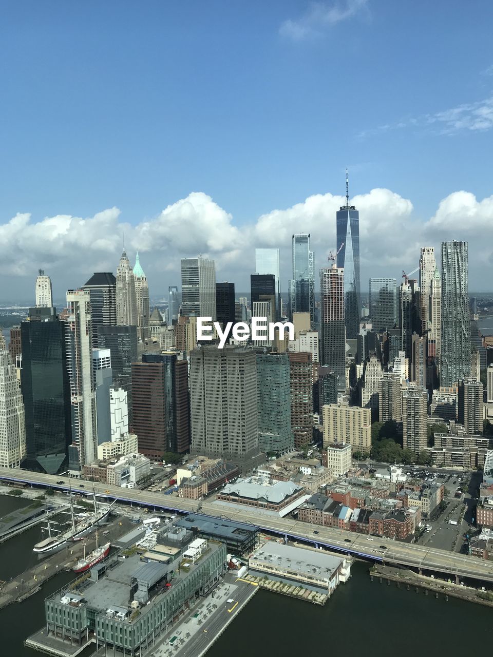 AERIAL VIEW OF MODERN BUILDINGS AGAINST SKY