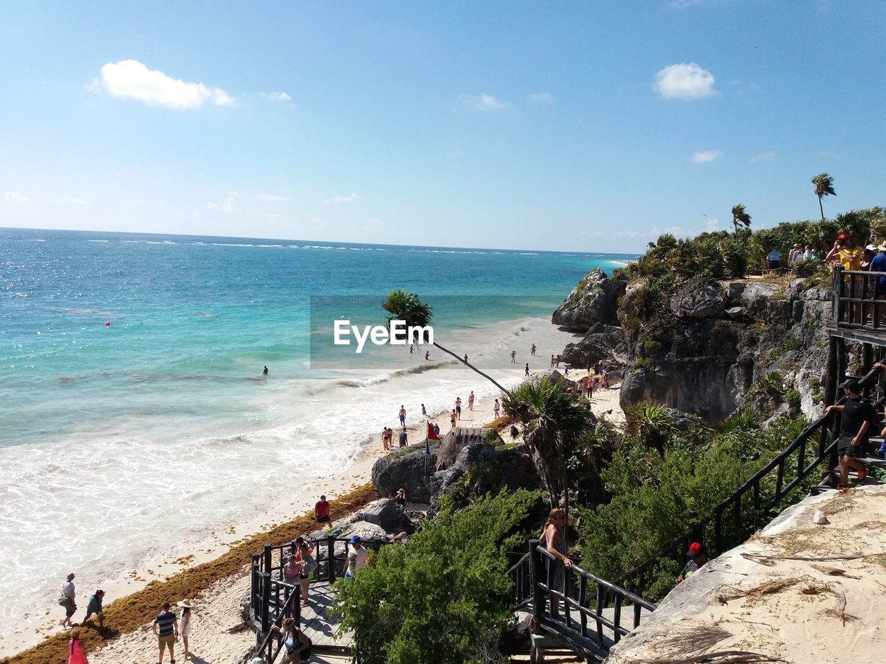 High angle view of people on beach against sky