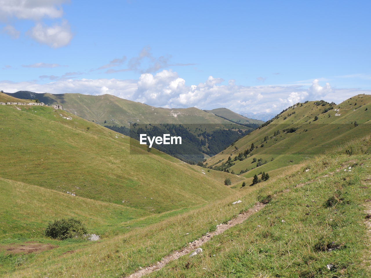 SCENIC VIEW OF LANDSCAPE AND MOUNTAINS