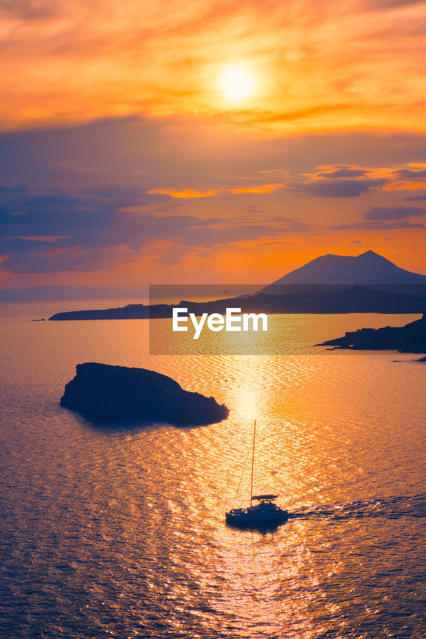 Aegean sea with islands view on sunset