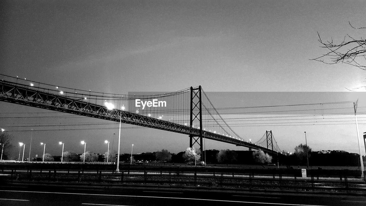 SUSPENSION BRIDGE AGAINST CLEAR SKY