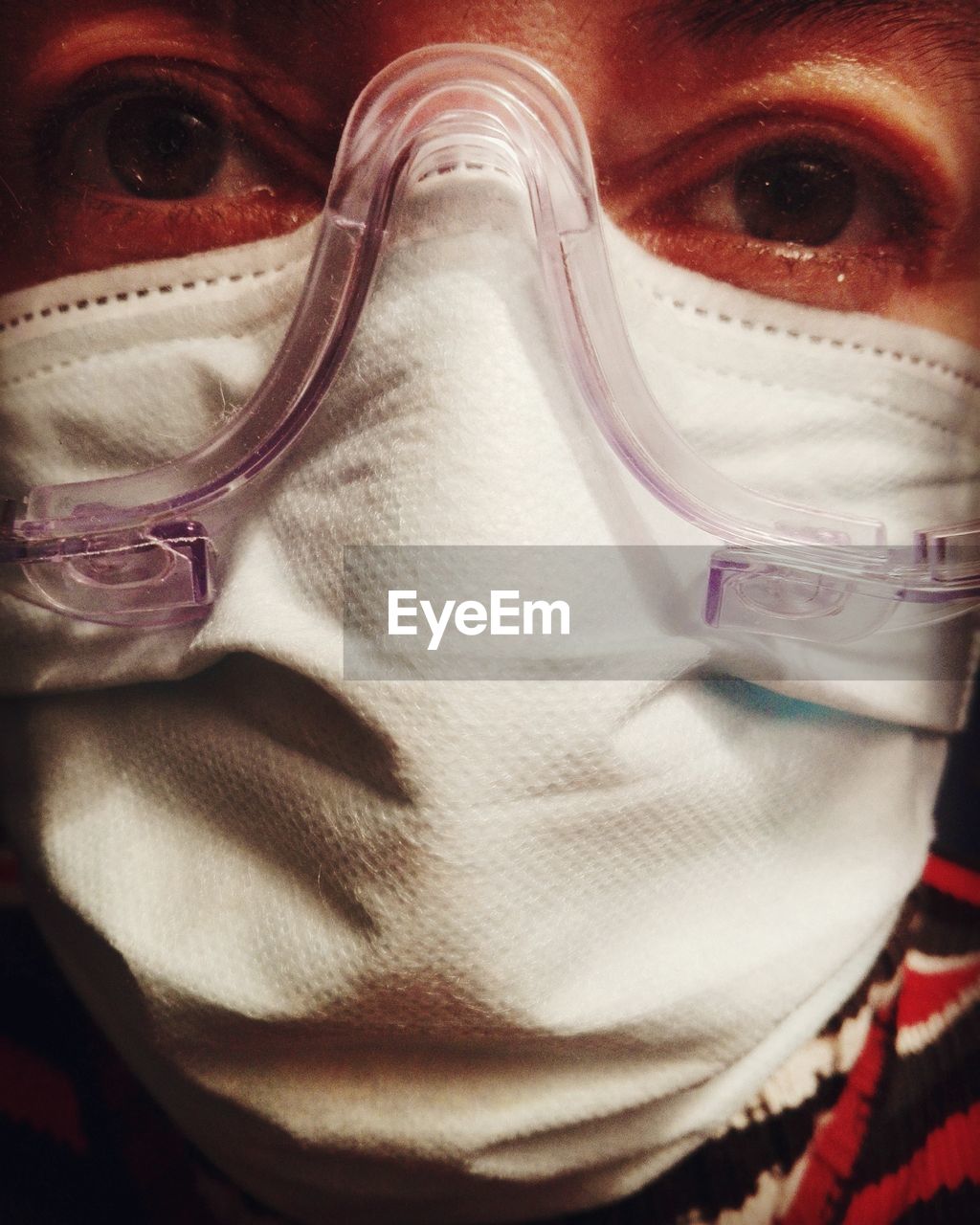 CLOSE-UP PORTRAIT OF MAN WEARING MASK
