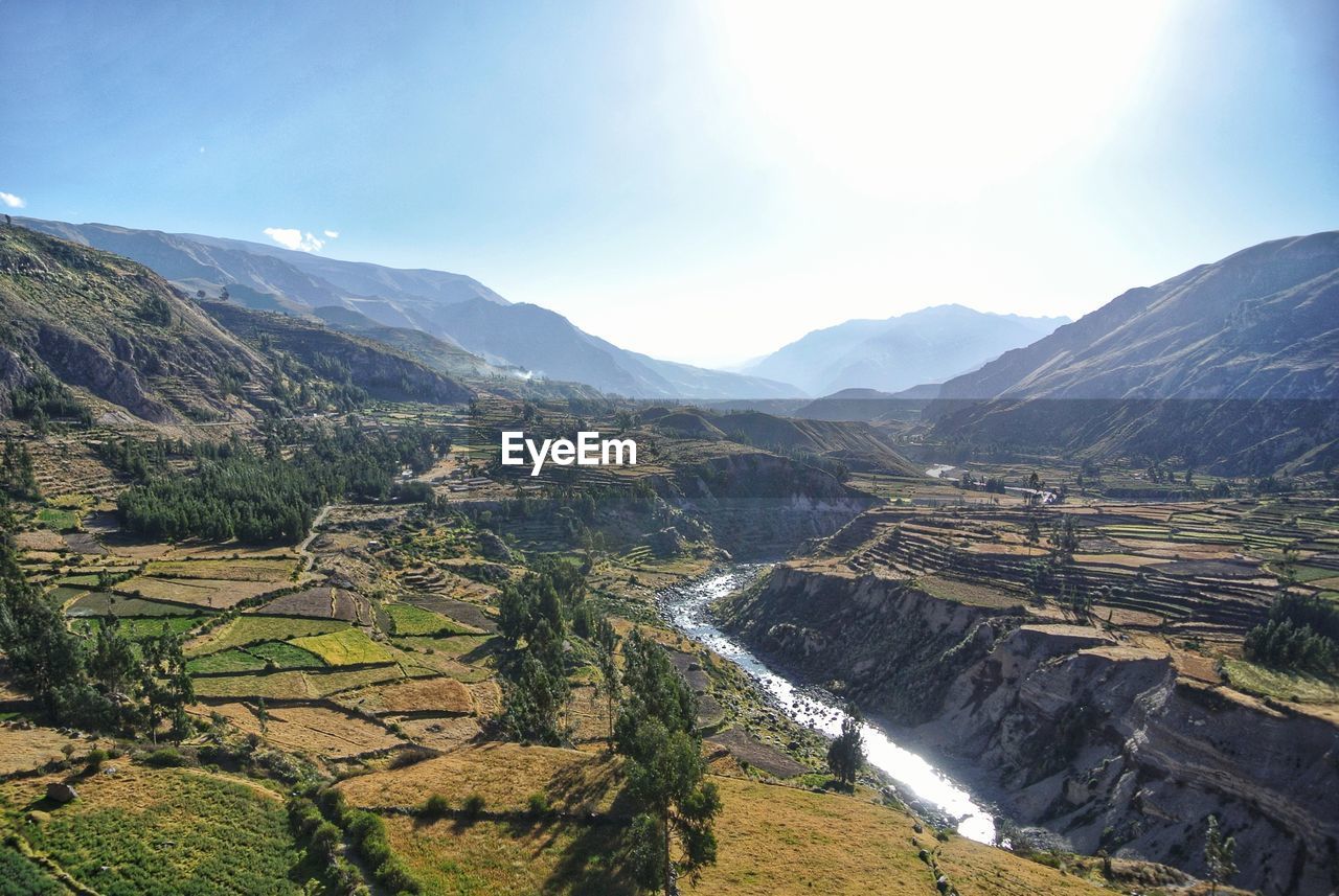 High angle view of landscape and mountains against sky