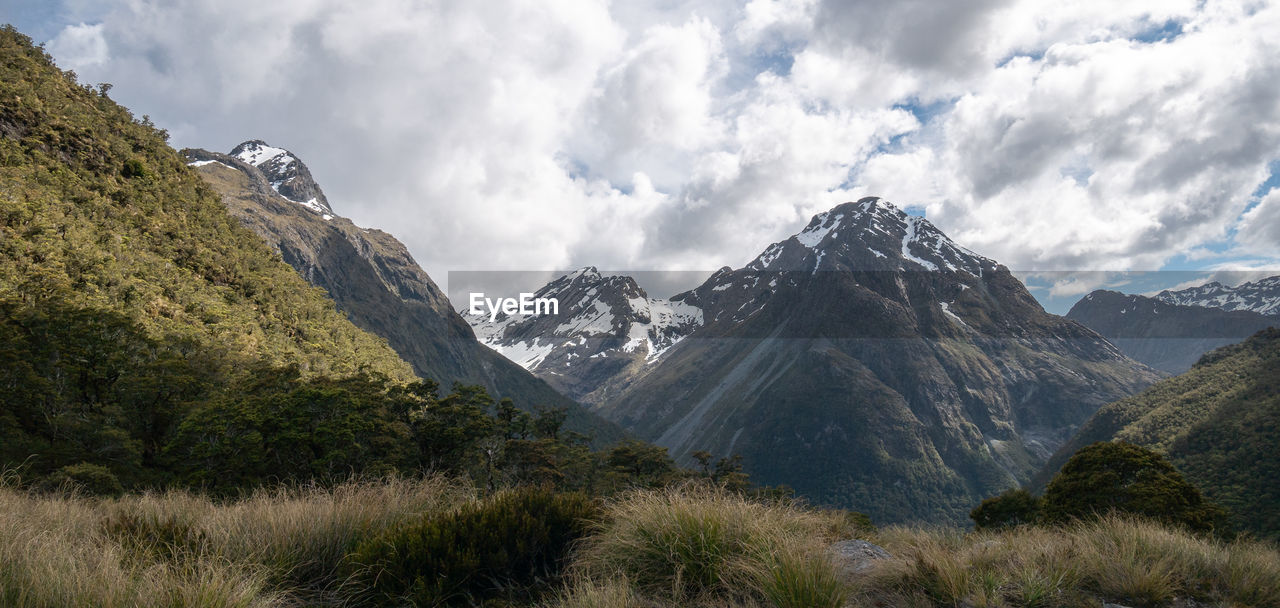 Mountains panorama during overcast day, shot on caples track, new zealand