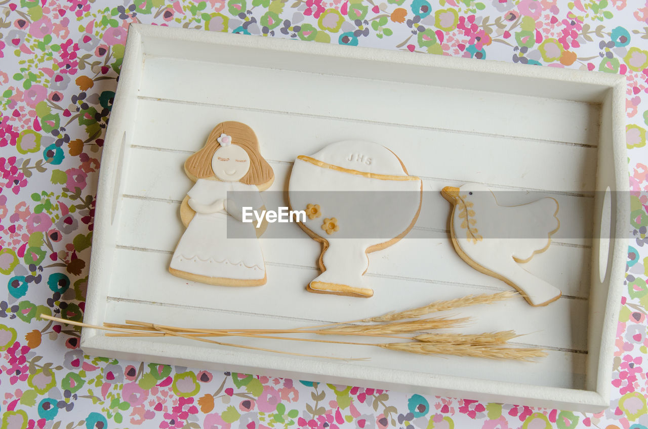 High angle view of cookies in tray on table