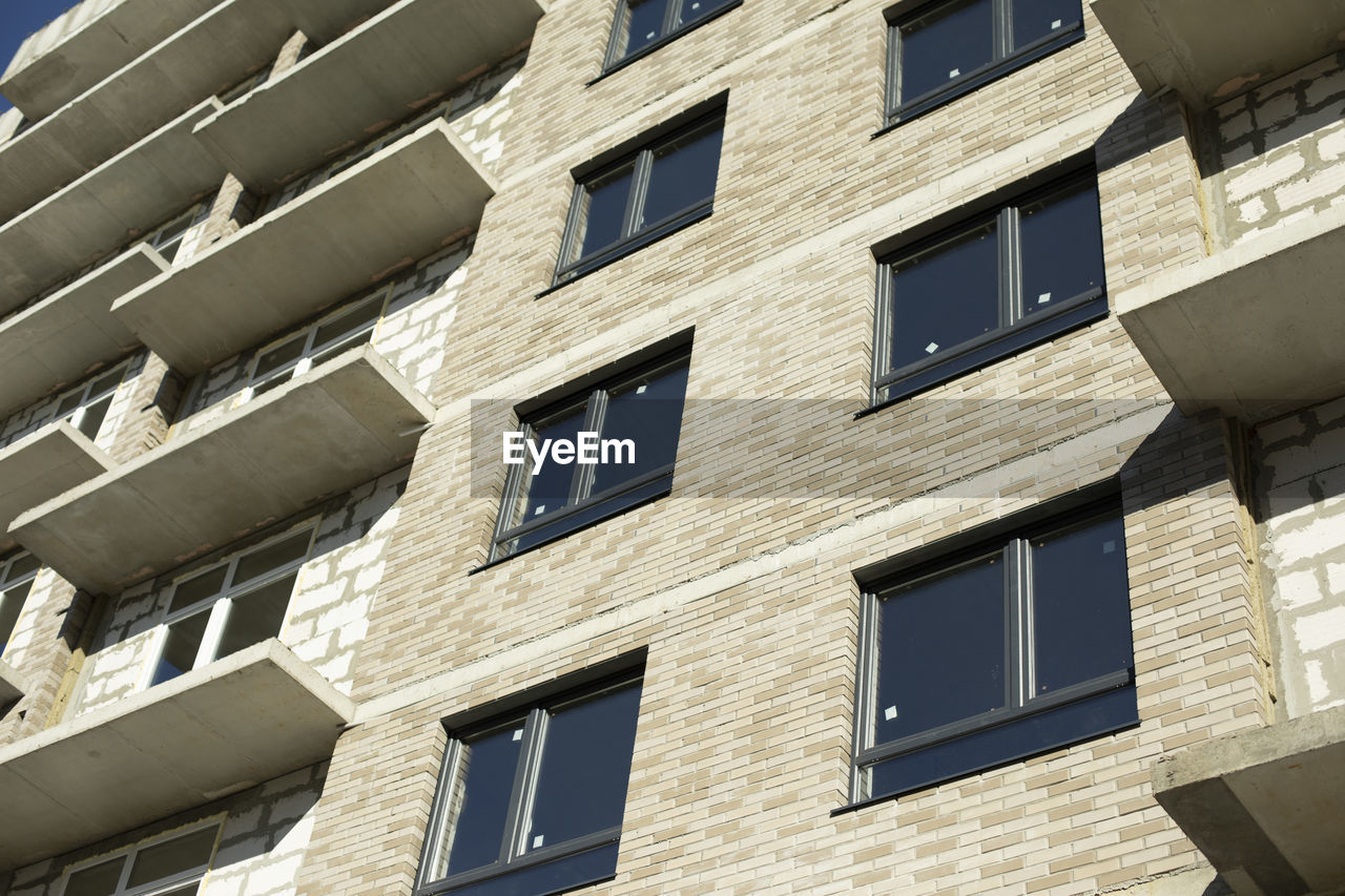 LOW ANGLE VIEW OF RESIDENTIAL BUILDINGS