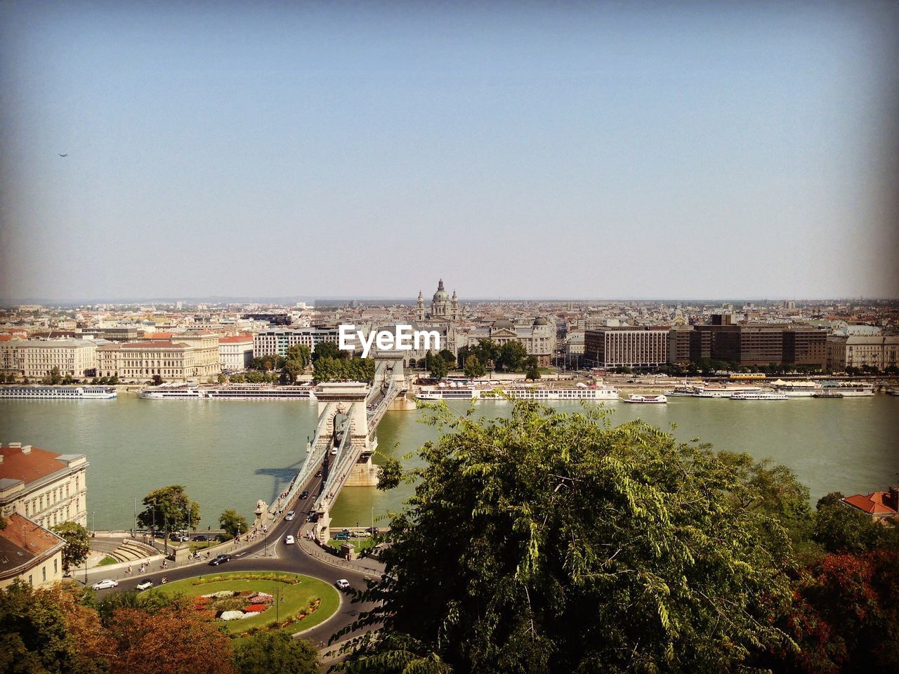 View of bridge over river in city