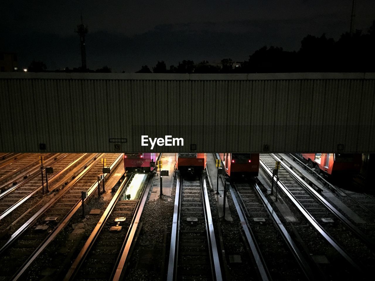 Bridge over railroad track at night