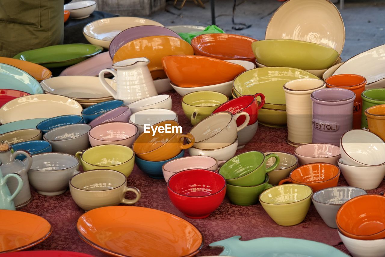 Colorful crockery on table