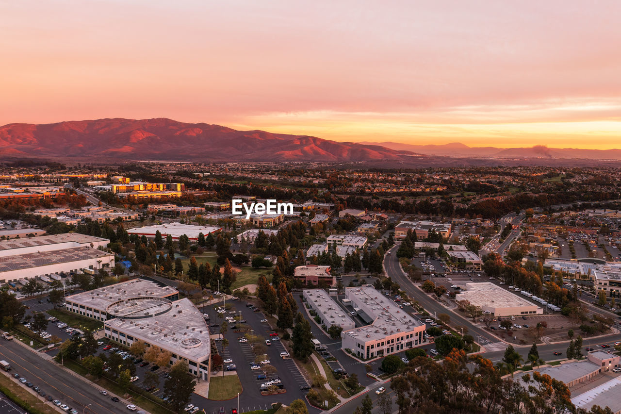 High angle view of townscape against sky during sunset