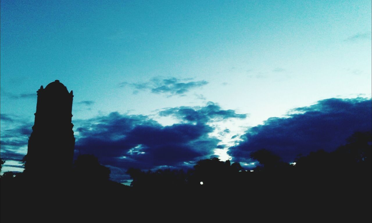 SILHOUETTE OF TREE AGAINST CLOUDY SKY
