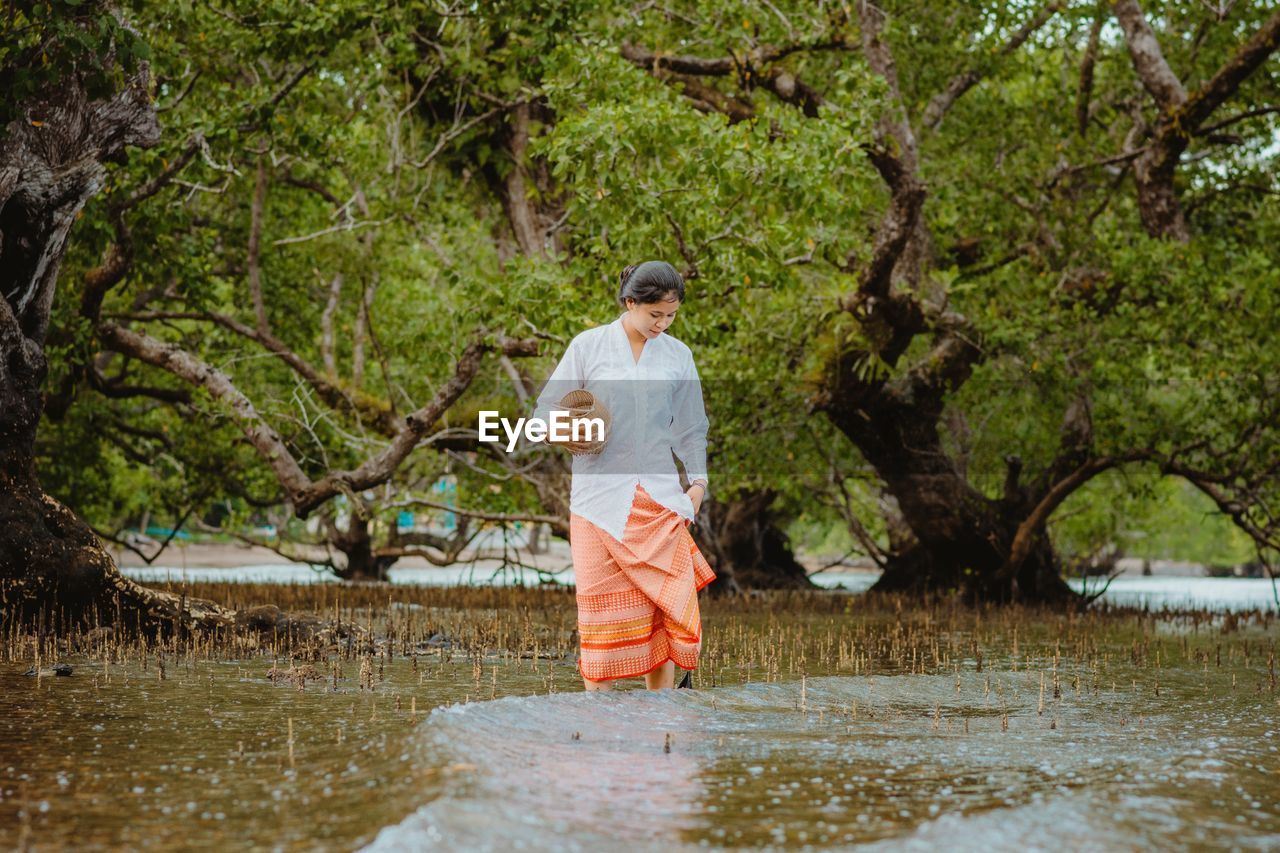 Country side girl with tradisional clothes in nature