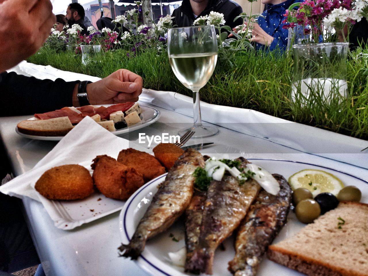 CLOSE-UP OF SERVED FOOD ON TABLE