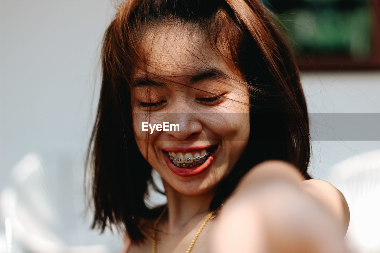 Portrait of a smiling young woman