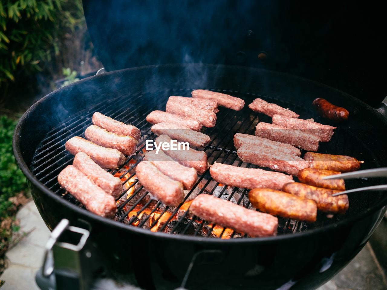 Close-up of meat on barbecue grill