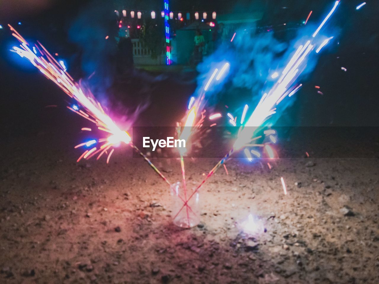 FIREWORK DISPLAY AT NIGHT DURING DUSK