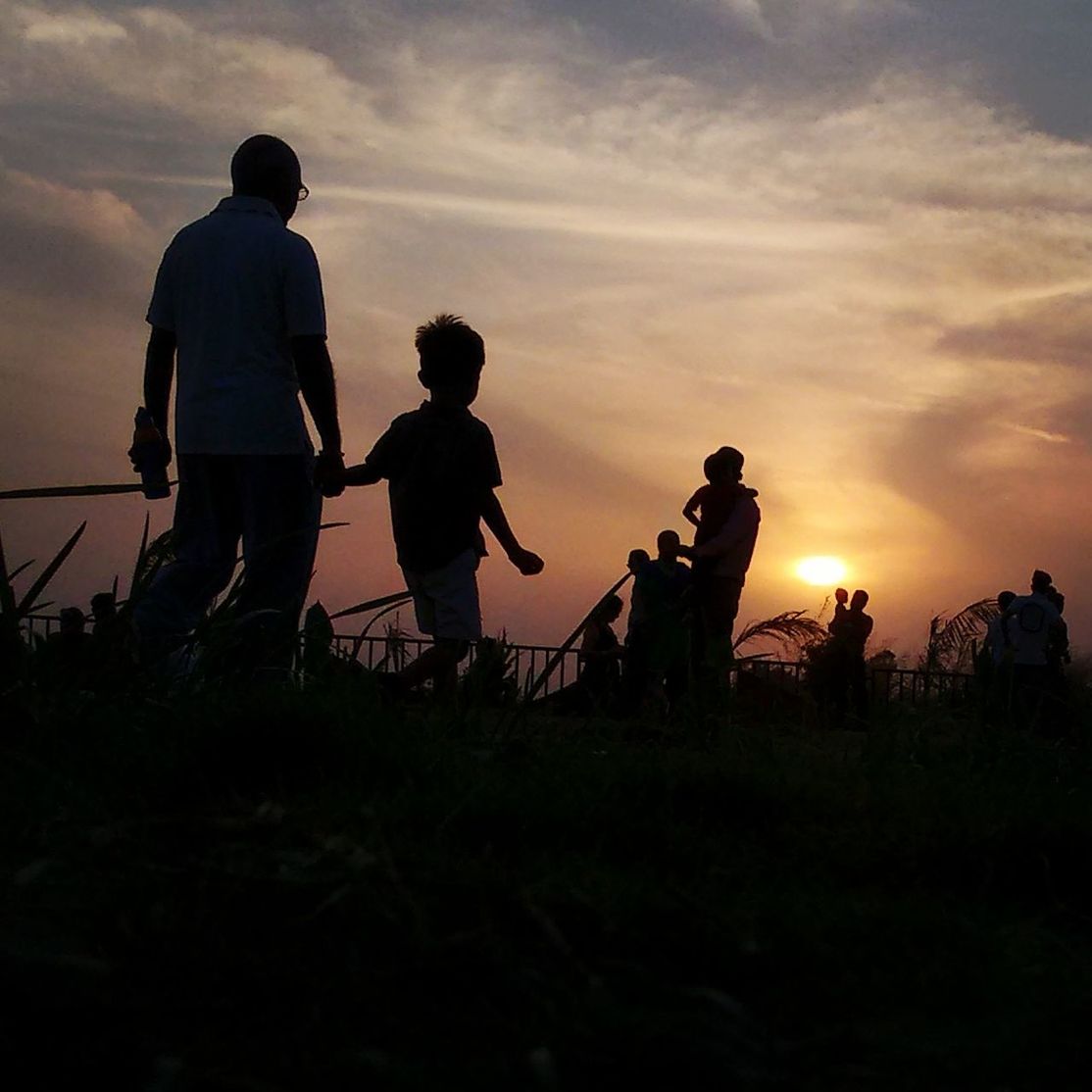 SILHOUETTE MEN PLAYING AGAINST SKY