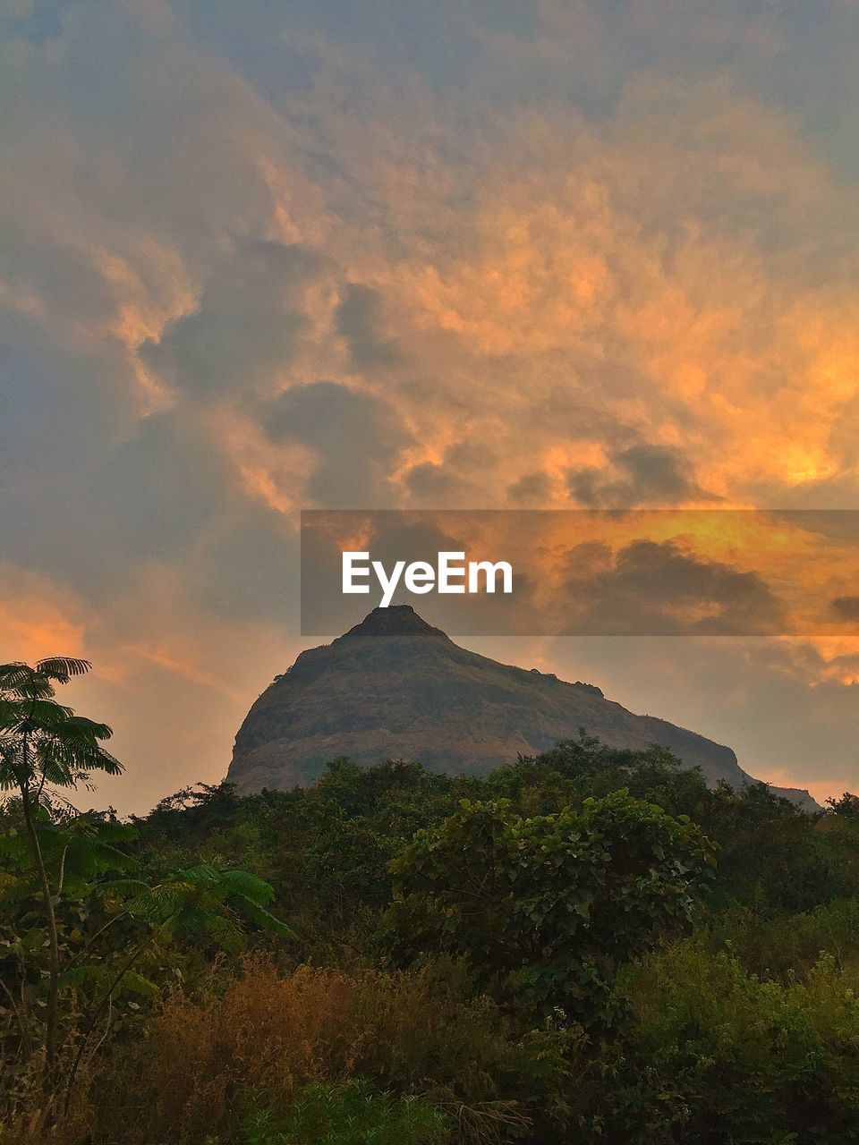 Scenic view of mountains against sky during sunset