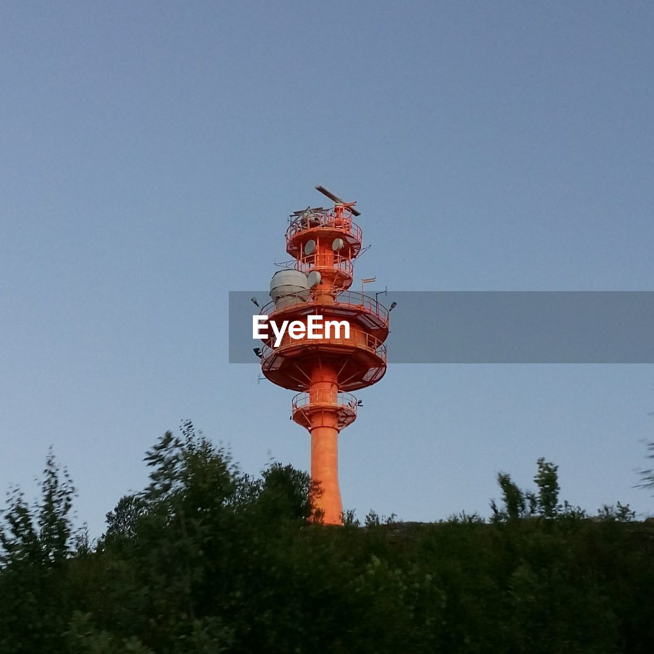 LOW ANGLE VIEW OF TOWER AGAINST CLEAR SKY