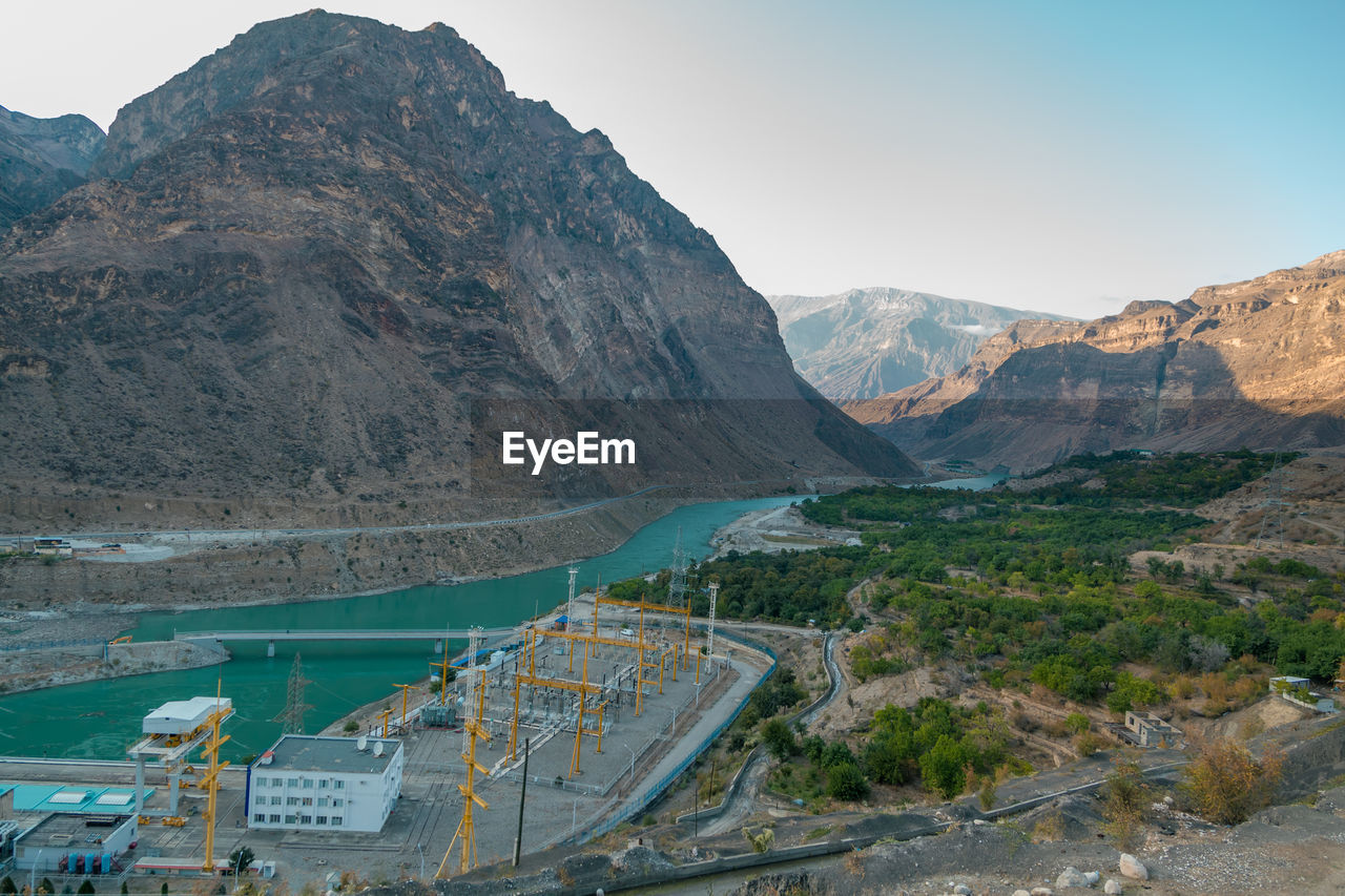 Hydro power plant on a mountain river, energy infrastructure