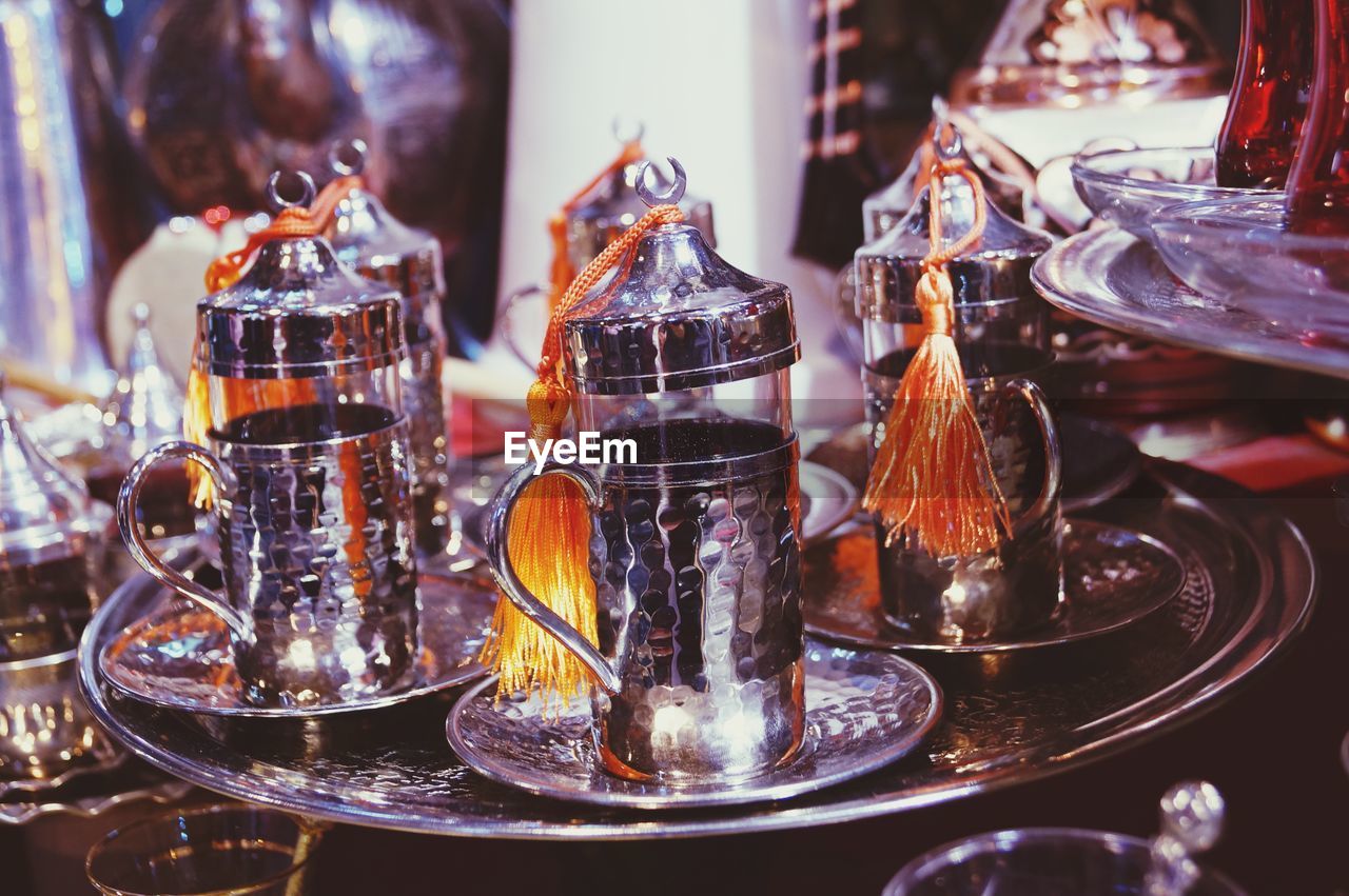 Close-up of containers on table