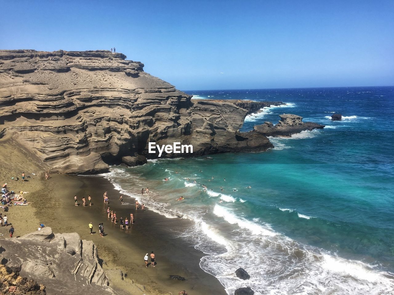 Scenic view of sea against clear blue sky