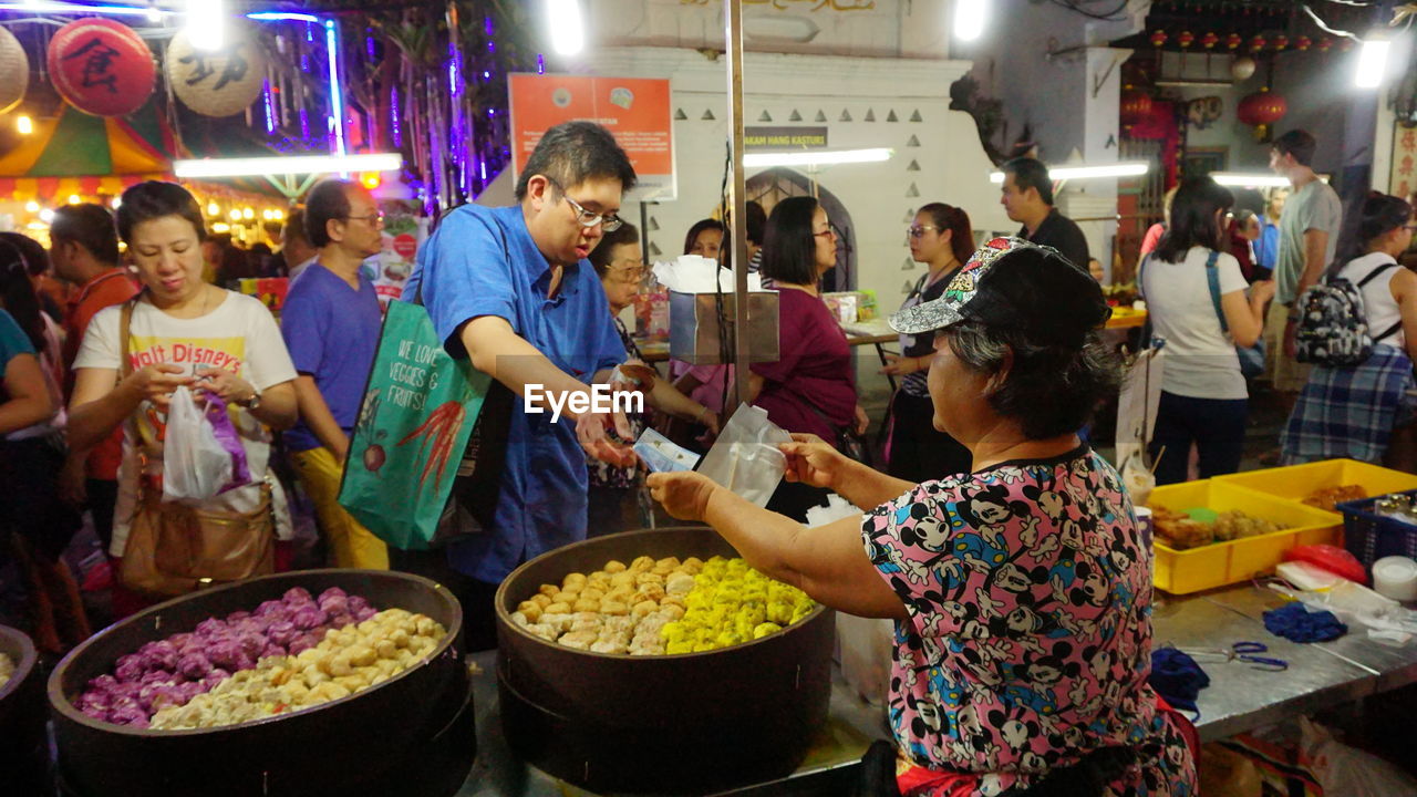 PEOPLE PREPARING FOOD