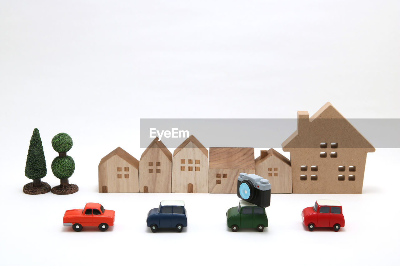 TOY CAR AGAINST WHITE HOUSE