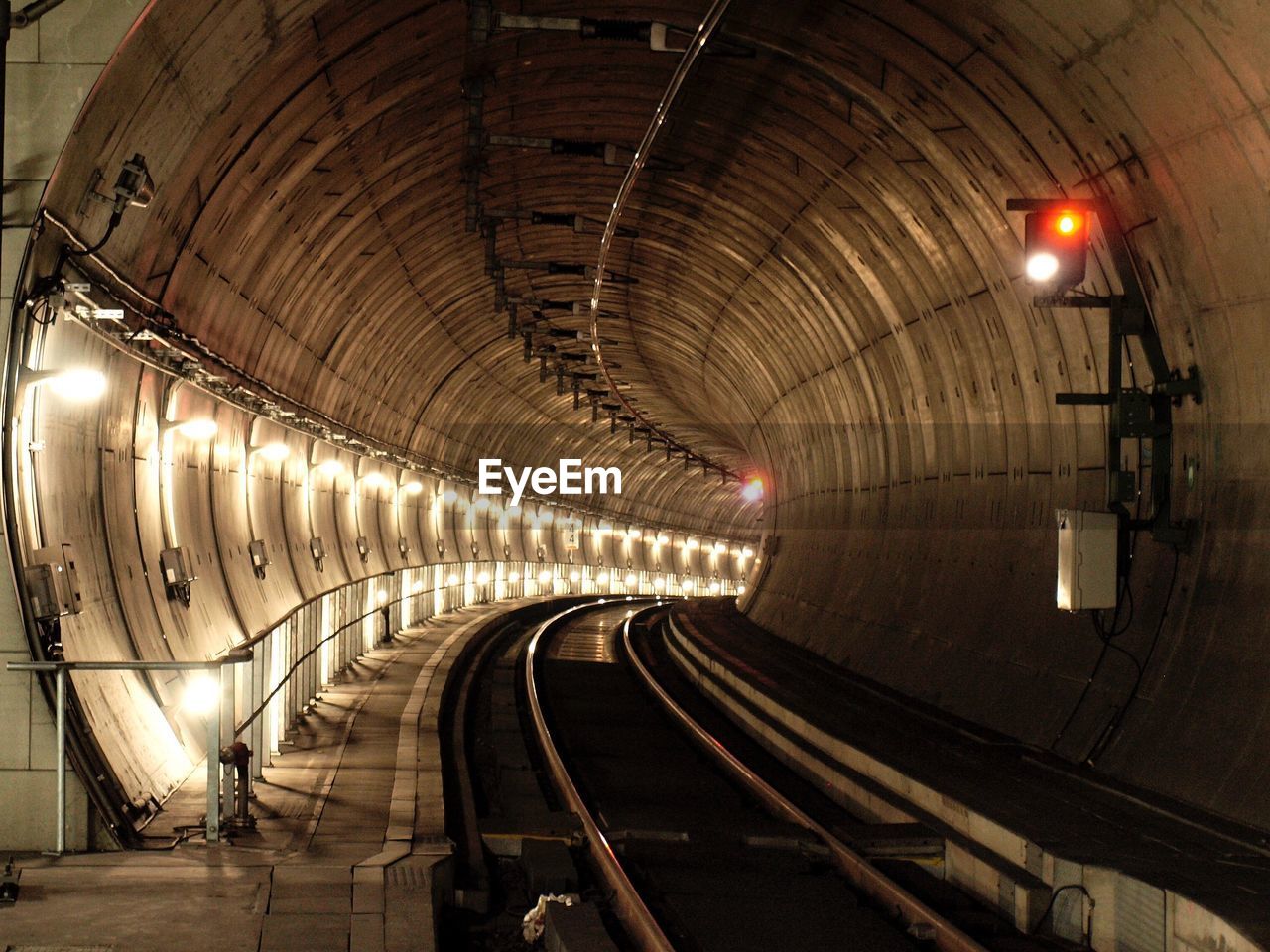 Interior of illuminated railway tunnel