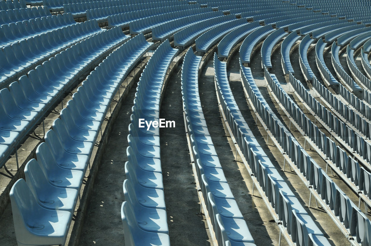 Full frame shot of empty seats in stadium